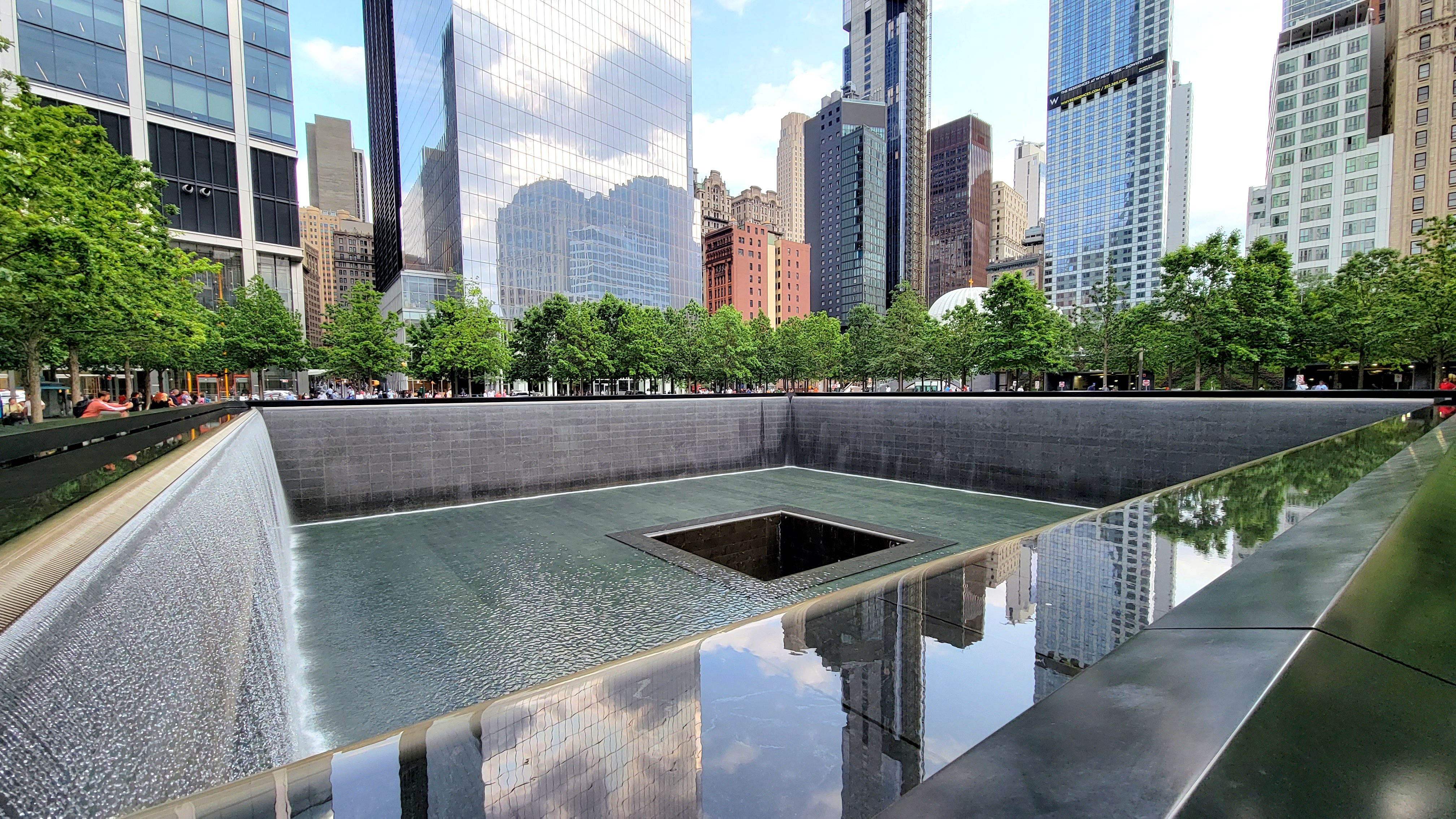 Waterfalls and reflections at the South Pool of the 9/11 Memorial